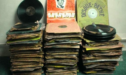 Romain, arrête de faire la mule et rends-moi mes 78 tours.