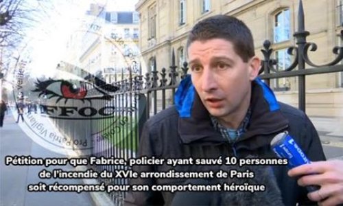 Pour une distinction honorifique au policier ayant sauvé 10 personnes du feu, à Paris.